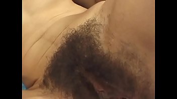 Ebony With An Incredibly Hairy Cunt